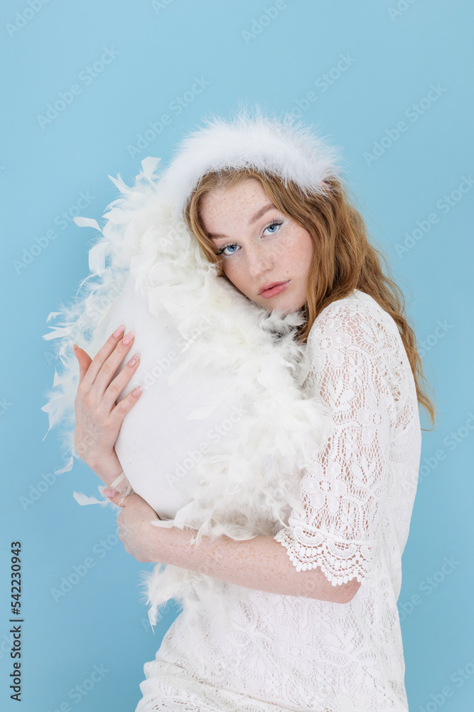 Hand Skin Care. Woman Hands With Soft White Feather. Body Care Hand Skin Care. Woman Hands With Soft White Feather. Body Care