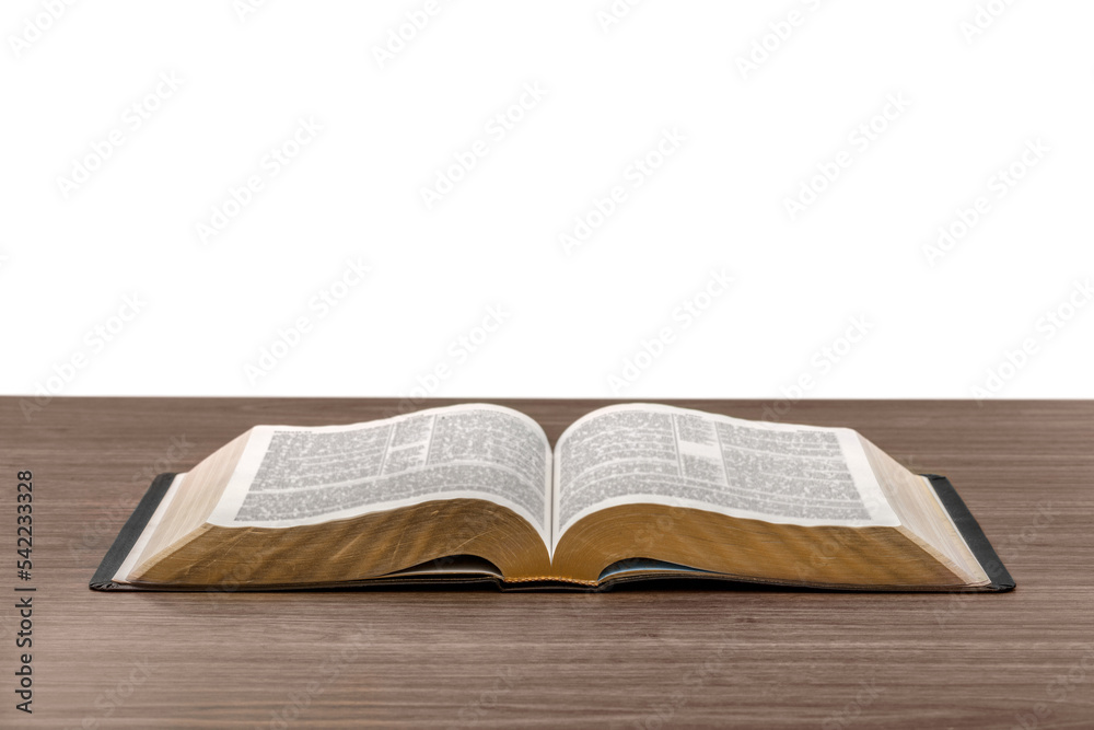 Open holy bible book on table