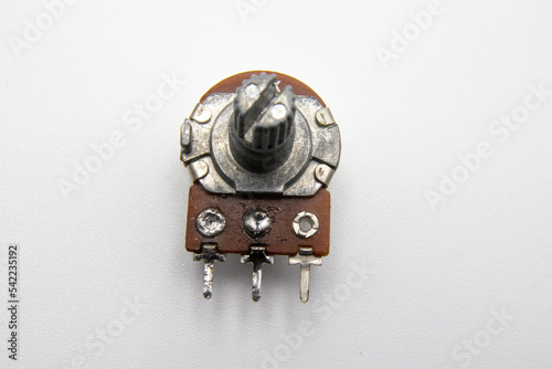 Close-up potentiometer on isolated background, selective focus. photo