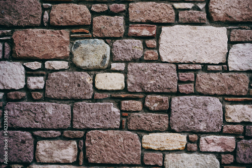 Vertical shot of stone tiles wall