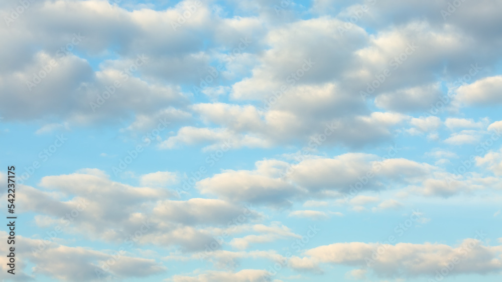 Obraz premium Background of white clouds on blue sky. Soft focus