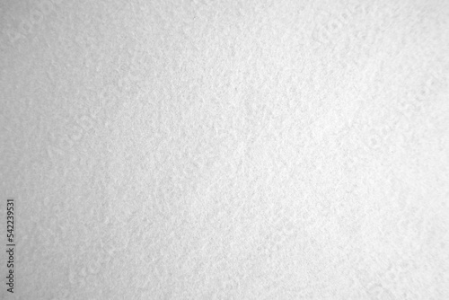 Felt white soft rough textile material background texture close up, felting and frieze poker table,tennis ball,table cloth. Empty white fabric background..