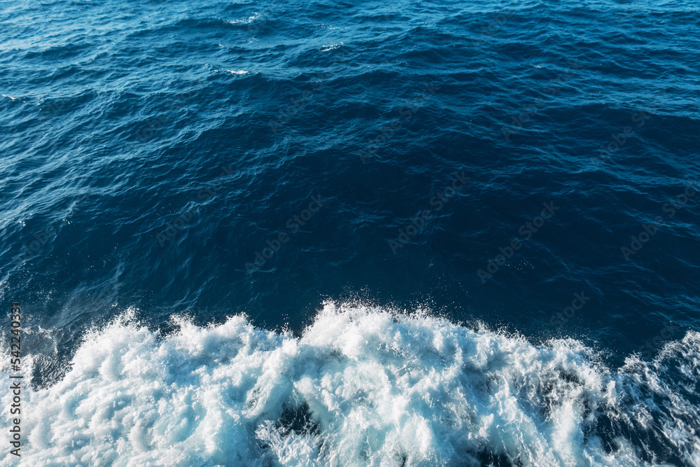 Amazing blue sea with waves and splashes. Journey Amazing blue sea with waves and splashes. Journey