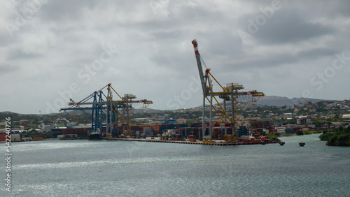Willemstad, Curacao - 04.28.2021 Container terminal port with gantry cranes of Willemstad, Curacao