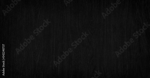 Black wooden background or texture