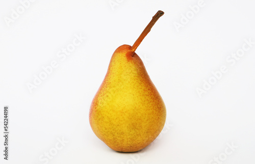 Ripe pear close-up on a white background.