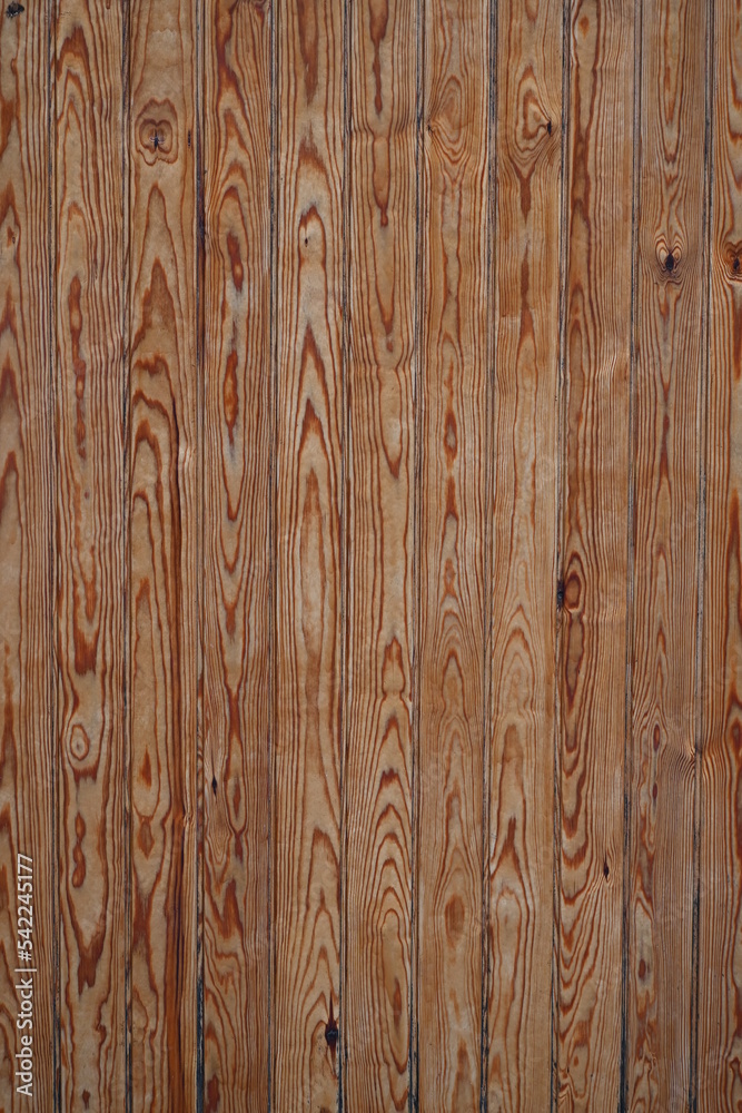 Fototapeta premium Fondo con detalle y textura de varias lamas de madera en tonos marrones, con vetas y nudos