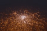 Aerial shot of Milan (Italy) at night, view from north. Imitation of satellite view on modern city with street lights and glow effect. 3d render