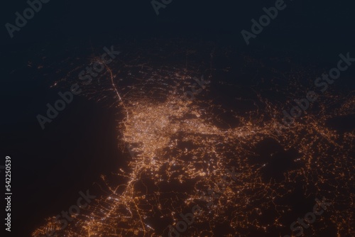 Aerial shot on Semarang (Indonesia) at night, view from west. Imitation of satellite view on modern city with street lights and glow effect. 3d render
