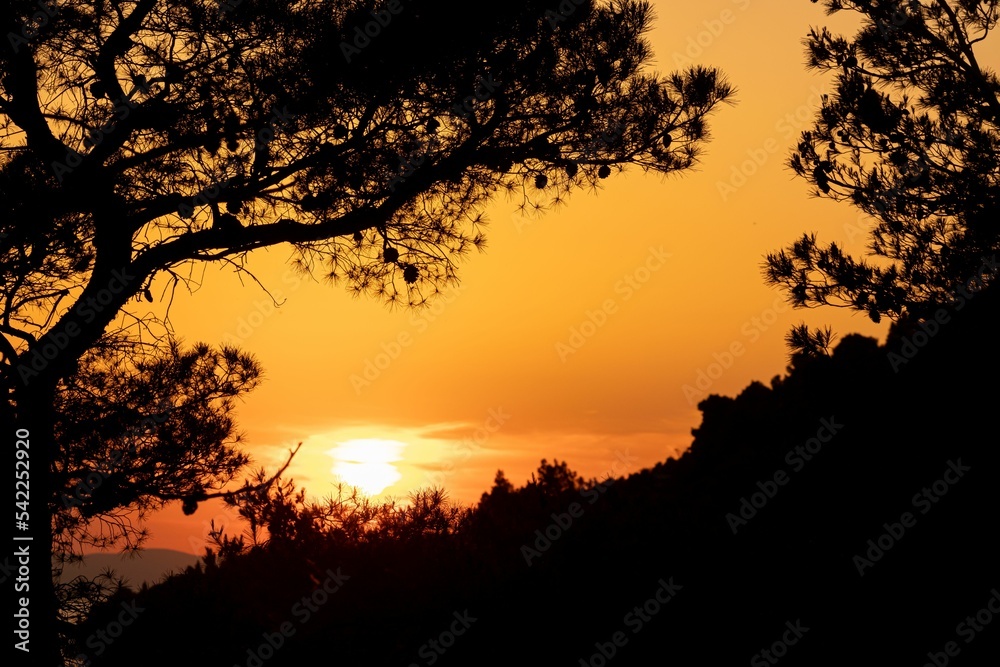View of the hills and the sea on a beautiful sunset View of the hills and the sea on a beautiful sunset
