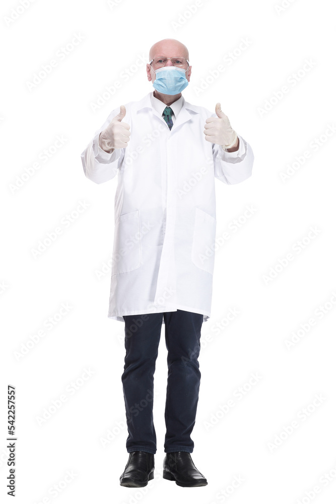 male doctor in protective mask showing thumbs up . male doctor in protective mask showing thumbs up .