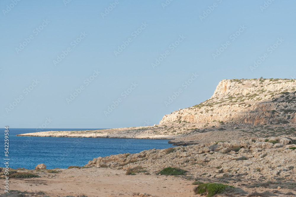 Landscape of rocks and blue Mediterrenian Sea from Cape Greco at Cyprus.