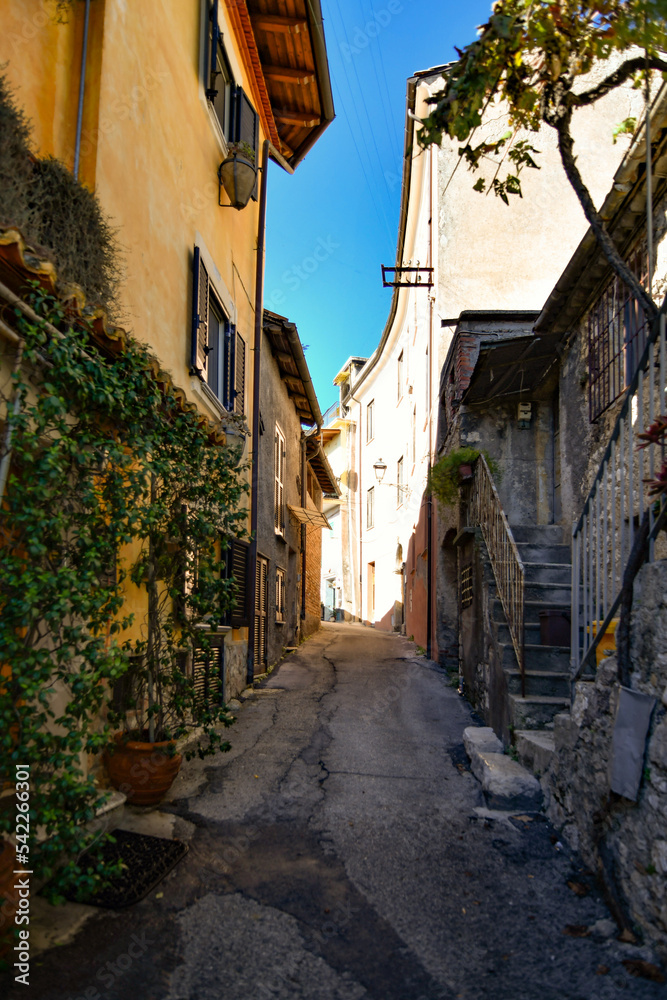 A small street between ancient buildings in Boville Ernica, a historic town in the province of Frosinone, Italy.