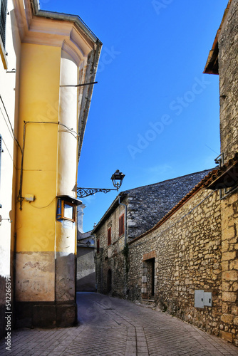 A small street between ancient buildings in Boville Ernica, a historic town in the province of Frosinone, Italy. photo