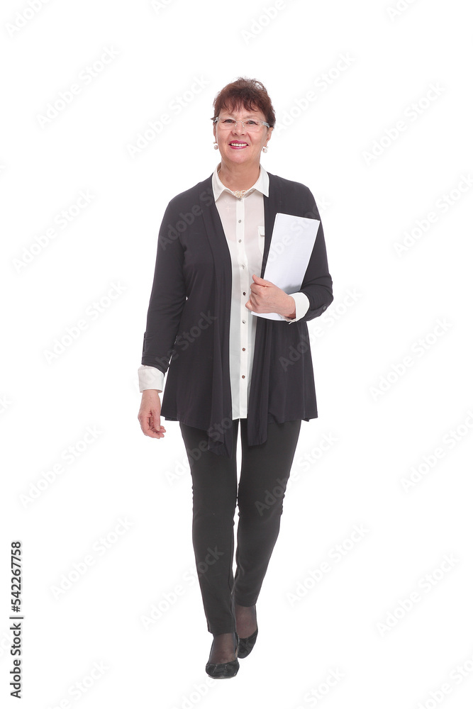 Adult female in black suit holding papers in her hand, isolated on white Adult female in black suit holding papers in her hand, isolated on white