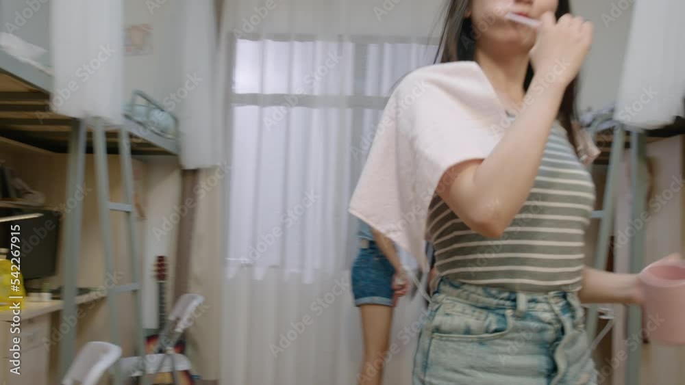 Young Chinese university students relaxing in dormitory,4K