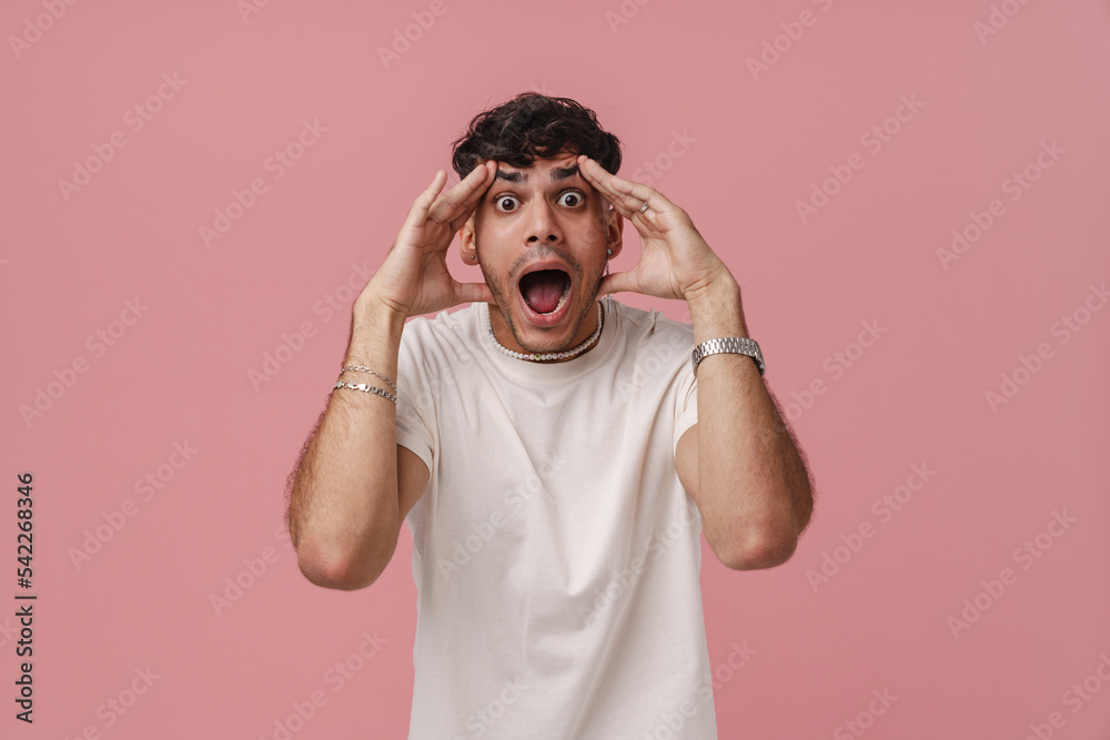 Young stylish shocked man with wide opened eyes and mouth, Young stylish shocked man with wide opened eyes and mouth,