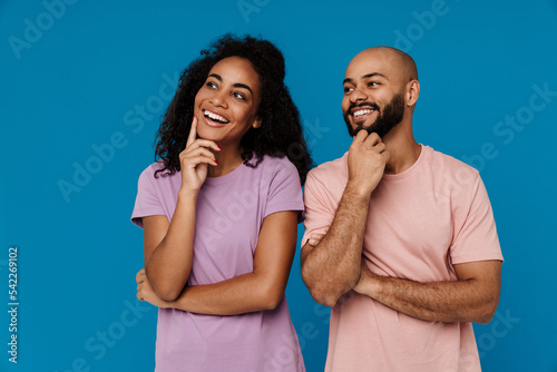 Black man and woman smiling and looking at each other