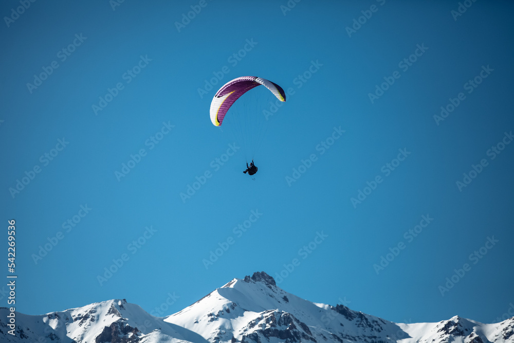 paragliding in winter in the mountains paragliding in winter in the mountains