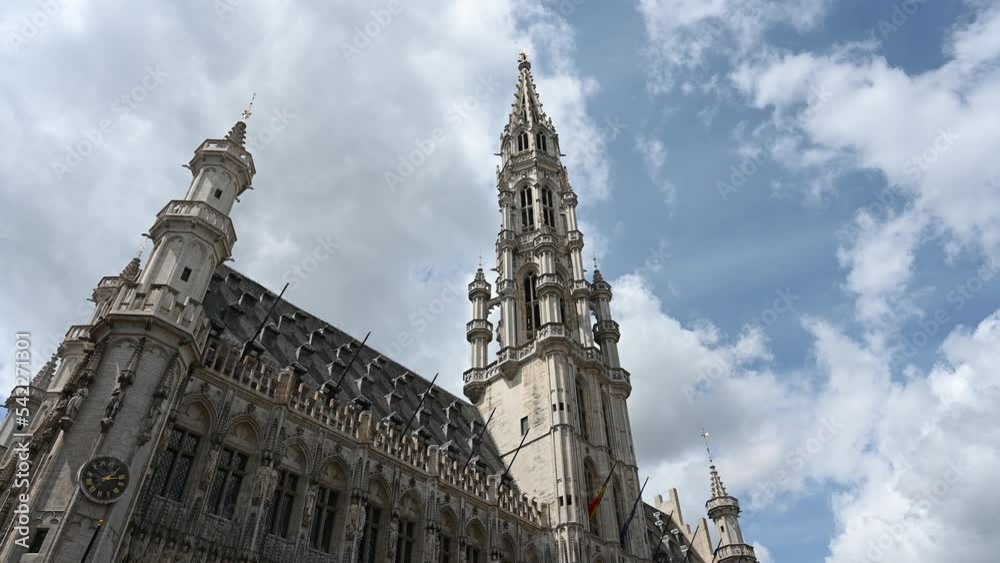 Bruxelles, Belgium: Time lapse of Town Hall with clouds passing by. Buildings in Brussels. Grand Place. Bruxelles, Belgium: Time lapse of Town Hall with clouds passing by. Buildings in Brussels. Grand Place.