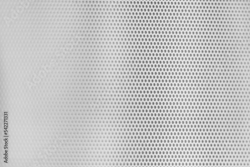 White grill texture with small aligned circular holes