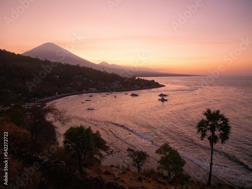 Aerial view of Bali with silhouettes of mountains at sunset, Indonesia