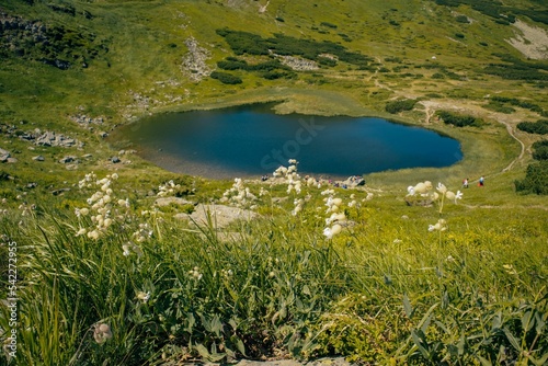 Scenic view of the Nesamovyte Lake in the Ivano-Frankivsk region on a sunny day photo