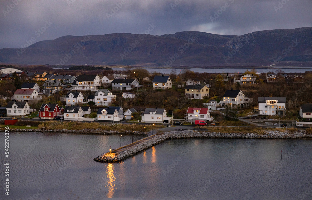 Brønnøysund after sunset with lights in the house and the street,Nordland county,Norway