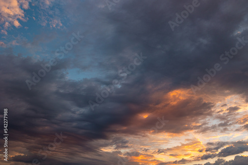 Cloudscape at sunrise. Sky view in the morning with dramatic clouds