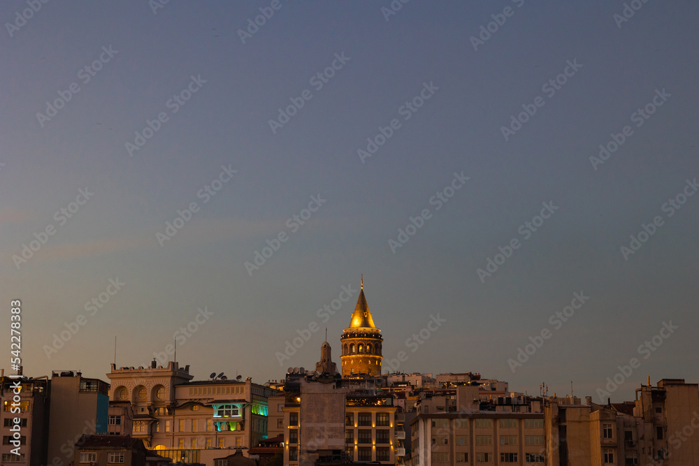 Galata Tower view in the evening from Golden Horn. Landmarks of Istanbul