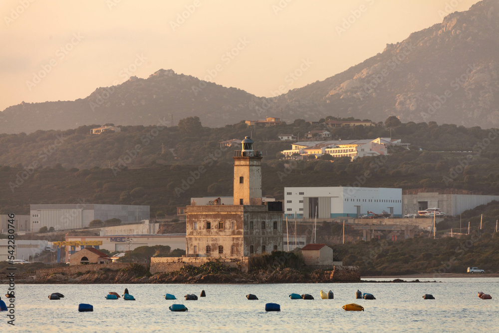 Iconic Olbia's lighthouse with mussels' cultivation and shipyard are