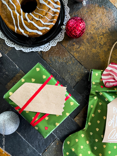 Handmade christmas presents wrapped with love: ornaments, cake, and gifts.