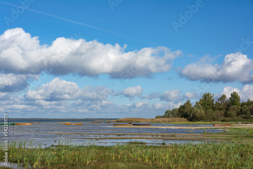 Svitiaz Lake  Shatsk National Natural Park  Volyn region  Ukraine. The Shatskyi Lakes group. Boat on the shore of the lake. Beach by the lake.