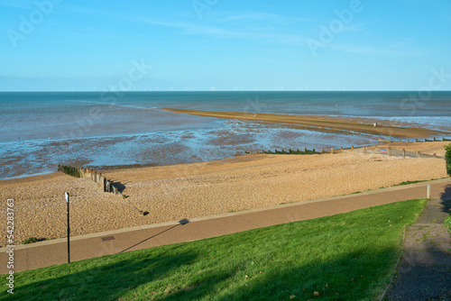 The Street on Tankerton Beach is a stretch of pebbles and sand revealed at low tide photo