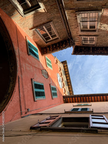 Loro Ciuffenna, Tuscany, Italy. Loro Ciuffenna village street view. Torre dell'orologio at via Dante Alighieri. Loro Ciuffenna is a comune in the Province of Arezzo in the Italian region  photo