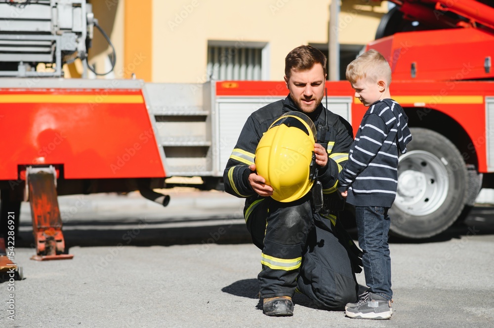 Protect people from dangerous with brave heart.Hero in fireman with uniform safe children from burn smoke Protect people from dangerous with brave heart.Hero in fireman with uniform safe children from burn smoke