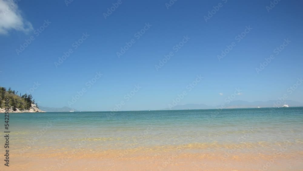 walking on a tropical beach, relaxing on Holiday, Queensland walking on a tropical beach, relaxing on Holiday, Queensland