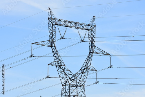 Electric pylon in an agricultural field in France.