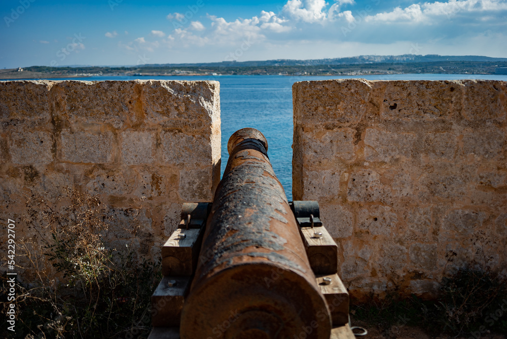 old cannon in the fortress, comino island, malta old cannon in the fortress, comino island, malta