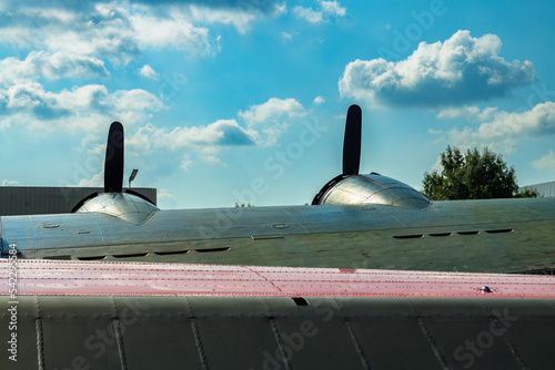 right wing and engines of B-17 flying fortress Texas Raiders taken from behind the horizontal stabilizer