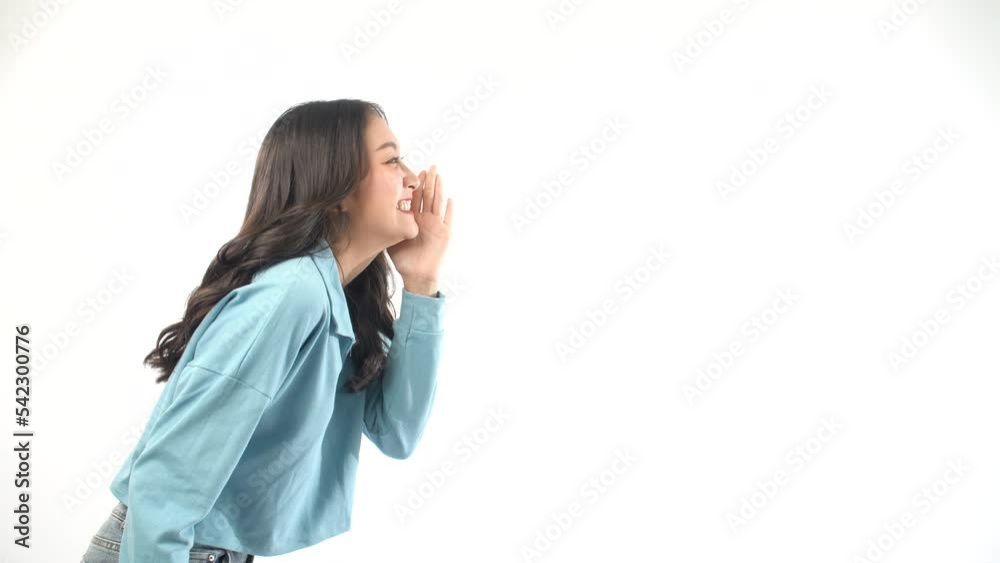 Excited Asian woman surprised wow sale product on empty over white background. Advertisement positive cheerful young girl presenting to copy space shocked amazed holding hand on mouth over isolated. Excited Asian woman surprised wow sale product on empty over white background. Advertisement positive cheerful young girl presenting to copy space shocked amazed holding hand on mouth over isolated.