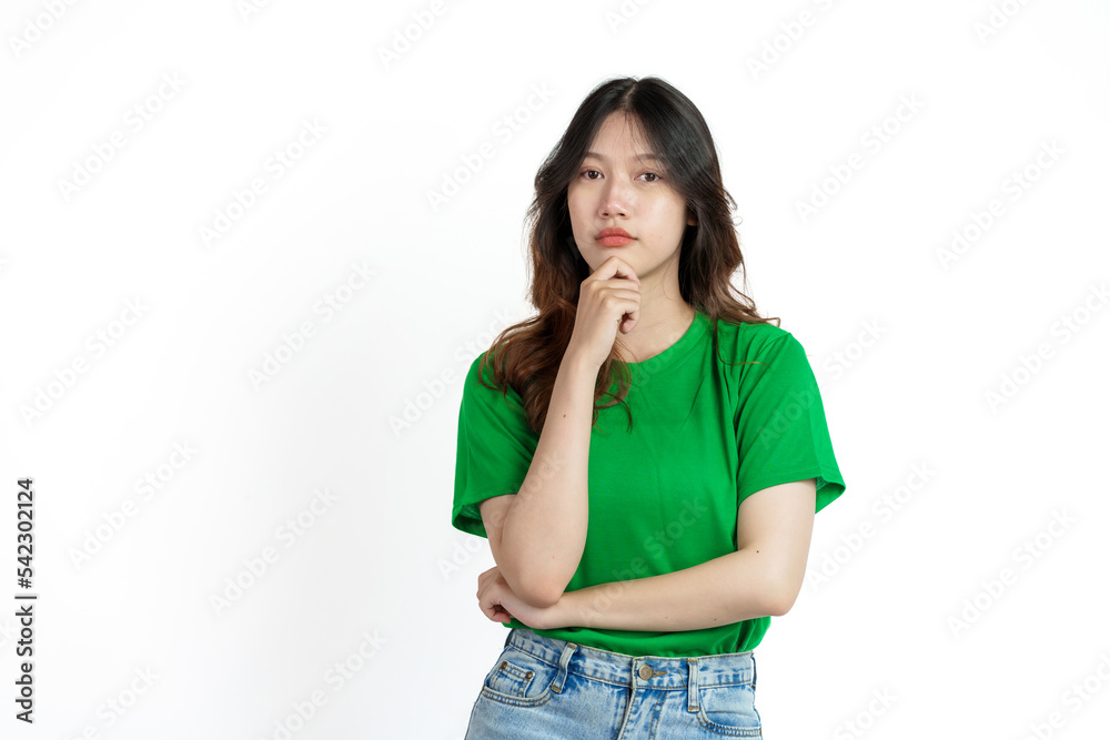Beautiful confident Asian woman in green empty t-shirt isolated on white background. Tired, bored concept Beautiful confident Asian woman in green empty t-shirt isolated on white background. Tired, bored concept