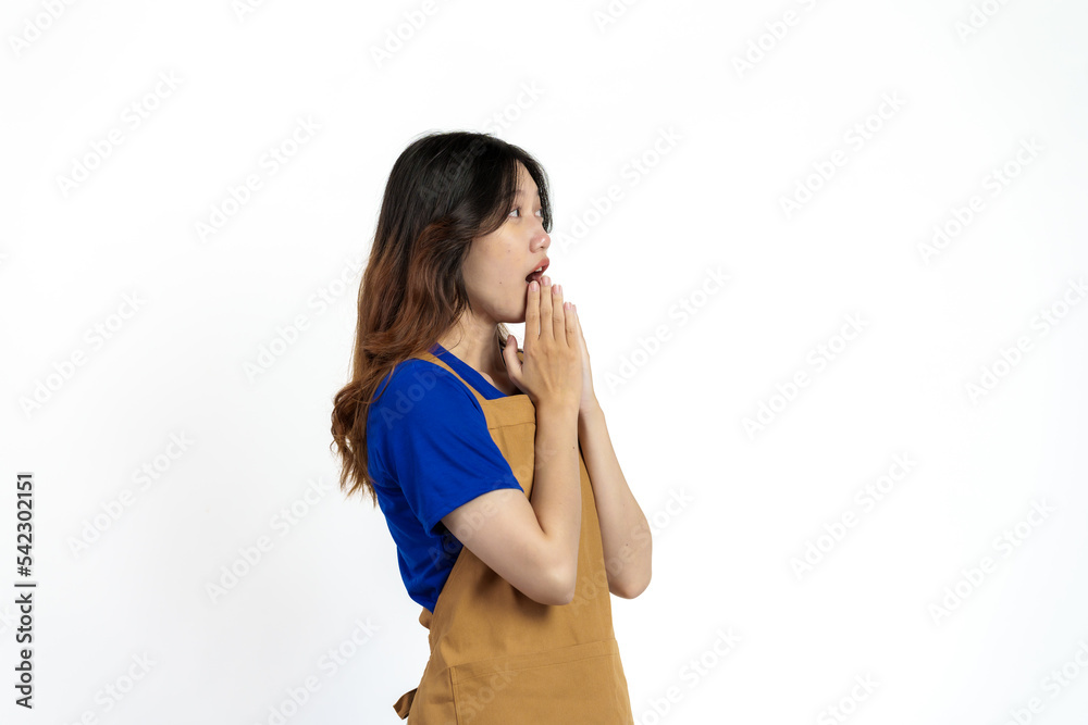 Cheerful young pretty asian woman blue t-shirt and apron coffee owner isolated on white background. Cheerful young pretty asian woman blue t-shirt and apron coffee owner isolated on white background.