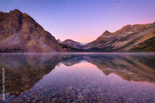 Bow lake. Mountain landscape at dawn. Lake and forest in a mountain valley at...