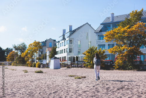 View of Hanko town coast, Hango, Finland, with beach and coastal waterfront, wooden houses and beach changing cabins, Uusimaa, Hanko Peninsula, Raseborg sub-region, summer sunny day photo