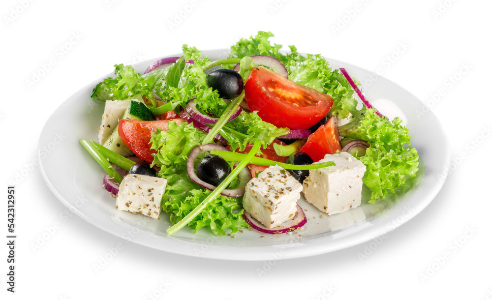 Closeup view of a plate of fresh healthy Greek salad with lettuce, basil, feta, onion, olives, radish and tomato