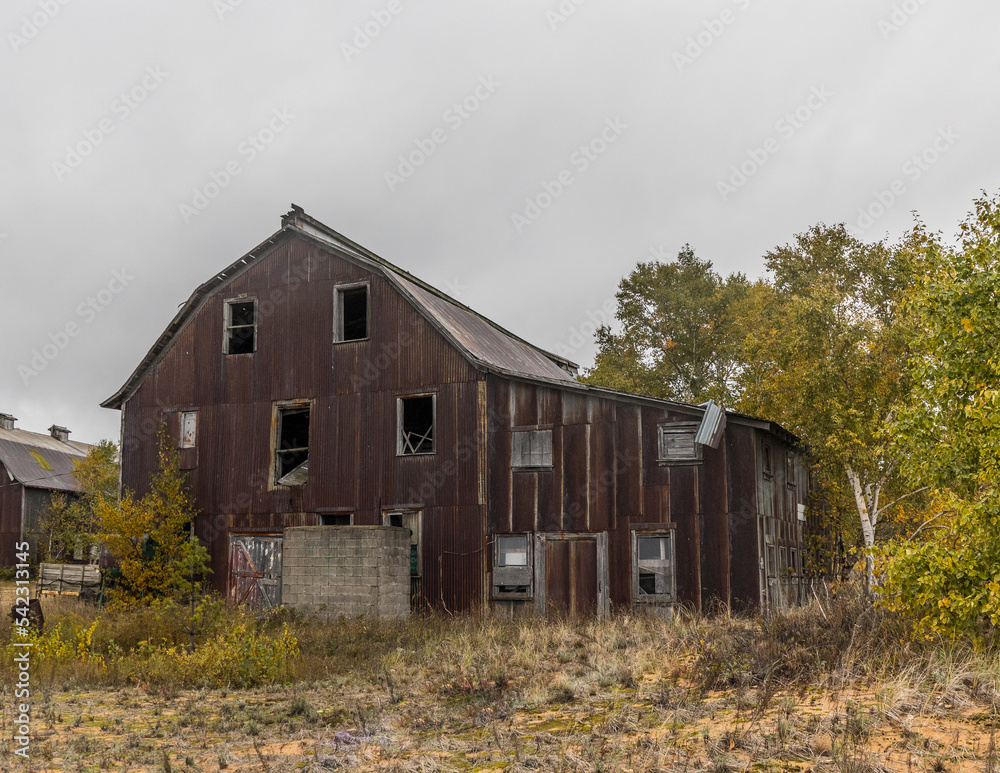 old red barn in autumn old red barn in autumn