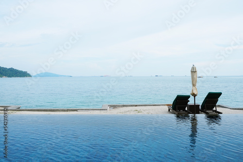 Beautiful infinity pool overlooking Pangkor laut island.