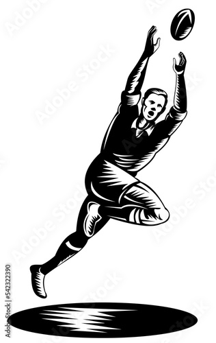illustration of a rugby player catching the ball on isolated background done in retro woodcut style © patrimonio designs
