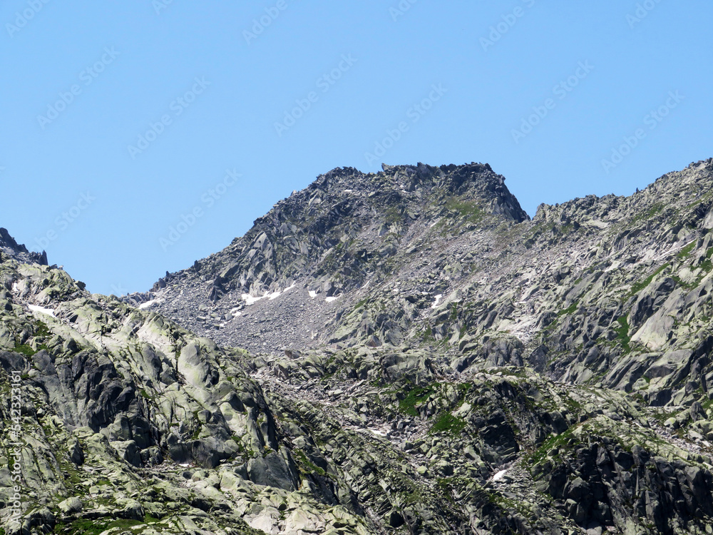 Rocky mountain peak Pizzo della Valletta (2726 m) in the massif of the Swiss Alps above the St. Gotthard Pass (Gotthardpass), Airolo - Canton of Ticino (Tessin), Switzerland (Schweiz)